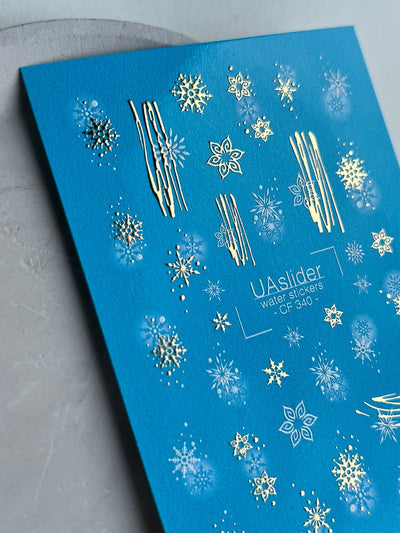 UA Slider 2D Nail Decal CF-340 Gold Snowflakes and Abstract Winter Lines Water­slide Nail Decals